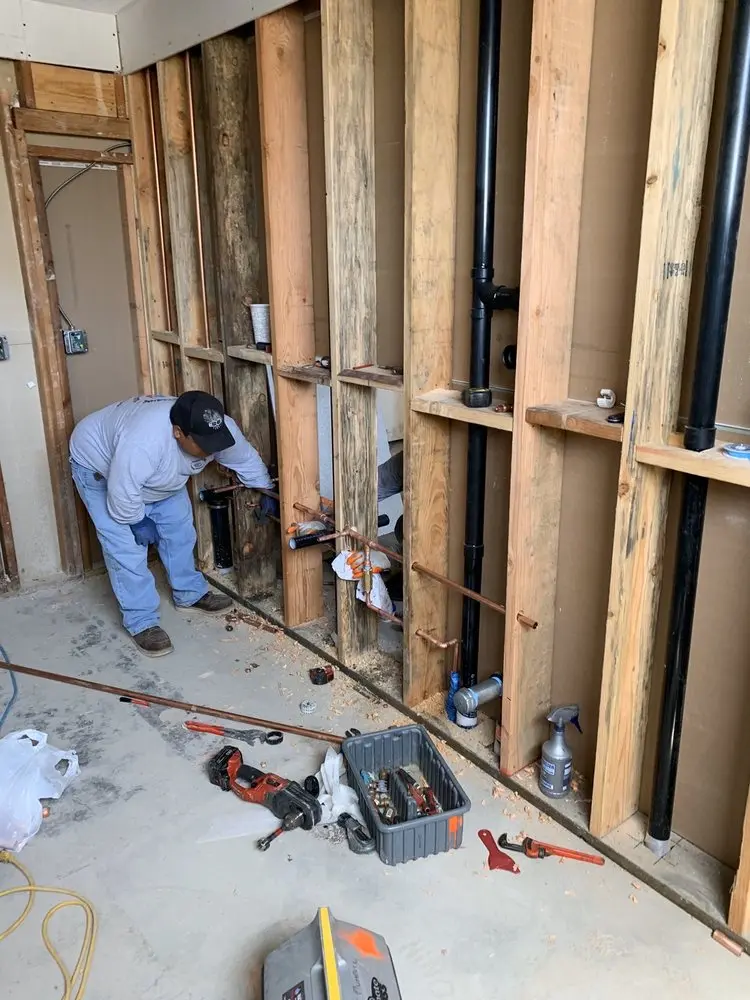 Commercial rough-in plumbing for Water Heater Replacement in American Village